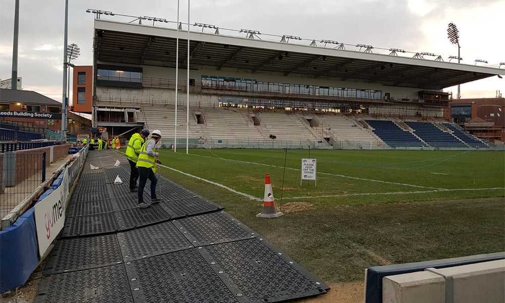 MaxiTrack Supports Crane on Stadium Turf
